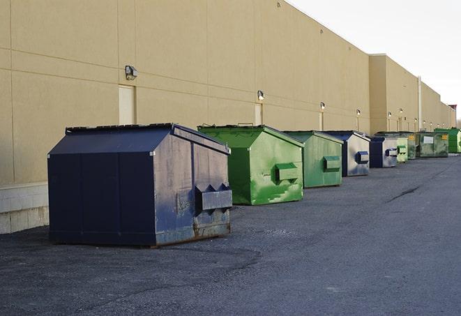 dumpsters lined up waiting to be filled with construction waste in Granada Hills, CA